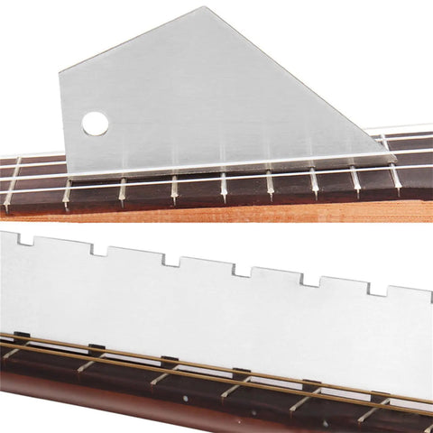 Pro Grade Complete Guitar Maintenance Kit with notched straight edge and string action ruler on fretboard.