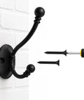 Heavy Duty Black Wall Mounted Coat Hooks 10 Pack With Complete Hardware Kit No Fuss Setup showing a wall hook and screws for installation.