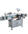 Heavy Duty Automatic Round Bottle Labeler With Quick Turntable And Smart Touchscreen Controls For Flawless Wrinkle Free Packaging And Hassle Free Operation Up To 3 Inch Bottles, stainless steel machine with labels.