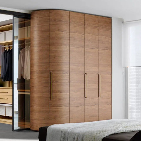 Wooden wardrobe with sleek handles in a modern bedroom