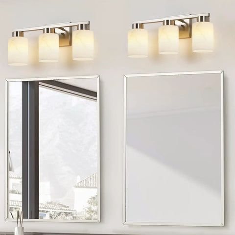 Heavy Duty 3 Light Bathroom Vanity Lights Brushed Nickel Wall Sconce With Striking White Marble Glass Shade above mirror.