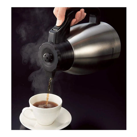 10 Cup Coffee Maker With Fresh Brew Plus Thermal Carafe Delivers Hot Coffee At 200 Degrees Fahrenheit Easy Setup For Strong Or Concentrated Ice Brew Stainless Steel And Black Finish A Real Game Changer pouring from thermal carafe into a white cup