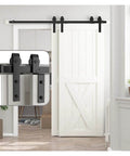 Barn Door Hardware Kit For Bypass Sliding Double Doors Heavy Duty J Shaped Roller Track System, installed view, matte black