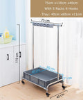 Stainless Steel Broom And Mop Organizer Rack With Five Racks And Six Hooks, heavy duty floor mounted, in a room setting.