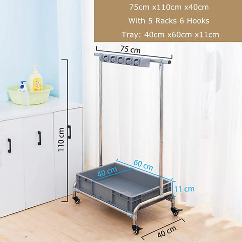 Stainless Steel Broom And Mop Organizer Rack With Five Racks And Six Hooks, heavy duty floor mounted, in a room setting.