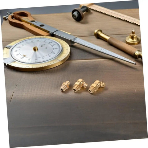 9 Piece Grease Fitting Kit With Copper Nozzle Caps For Cars And Trailers, including straight and angled nipples on wood surface