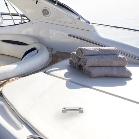 Saltwater Ready Marine Grade Stainless Steel Strap Webbing Clips With Burrfree Finish And Corrosion Resistance, Heavy Duty Deck And Yacht Rigging Hardware For Secure Anchor Grip On Rugged Boating on yacht deck with towels