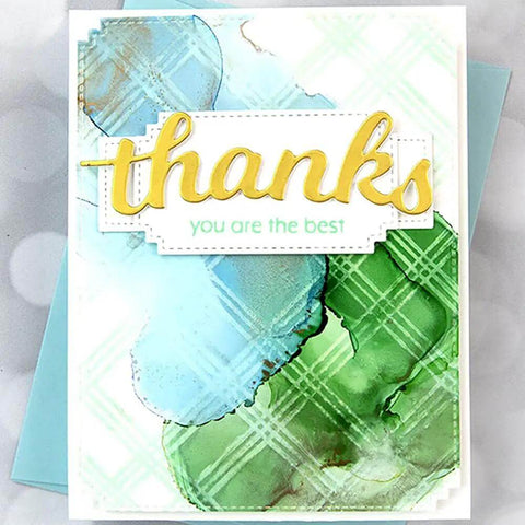 Handmade card with watercolor background and die cut 'thanks' sentiment, made using 7 Piece Rectangle Frame Die Cut Set