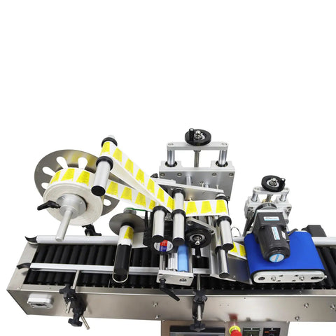 Workhorse Automatic Labeling Machine With Grippy Roller Conveyor showcasing labeling mechanism and yellow label roll.