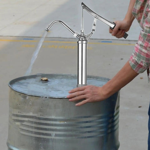 Heavy Duty Manual Oil Drum Pump With Ergonomic Handle For High Pressure Transfer And Effortless Sump Cleaning in use on oil barrel.