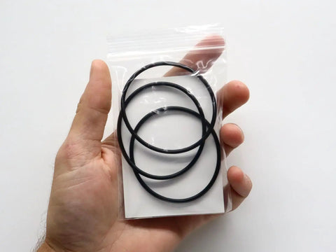 Replacement O Ring For Pool And Spa Filters 59000600 R0792000 Three Pack Fits Pentair FNS Plus Jandy Zodiac CL DEV Series DE Filters Durable EPDM Seal For LeakProof Performance And Easy Install For DIY Pros. three black EPDM o-rings in a hand-held bag