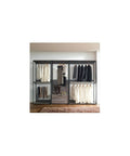 Heavy Duty Wood Walk In Closet Organizer System With Customizable Shelving And Rustic Gray Finish featuring hung clothes and pullout cabinet.