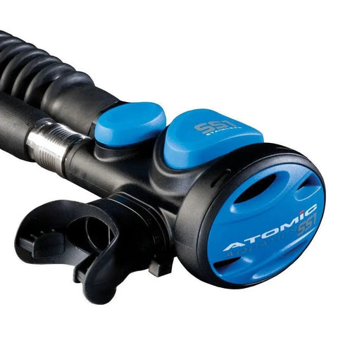 Close-up of SS1 Integrated Inflator Regulator For Scuba BCDs, high flow alternate air source, black titanium, blue accents.