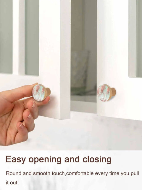 Two Pack Solid Beech Wood Cabinet Knobs 1.4 Inch Round Wooden Drawer Pulls With A Slick Green Forest Finish showing easy grip installation.