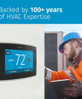 Smart Thermostat With Color Touchscreen WiFi And Mobile App Control Easy DIY Install Privacy Protected Data Works With Alexa Energy Star Certified C Wire Required Black ST75 installed on wall with service technician.