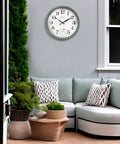 Outdoor patio with Cool Outdoor And Indoor Weather Station Clock With Thermometer Fahrenheit And Celsius Analog Two In One Wall Decor In Aged Teal Finish 13 Inch Perfect For Patio Porch Garden Kitchen Or Office Wall Mount installed on a wall.