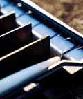 Close-up of BallistiX Twitch Tackle Tray For Jerkbaits And Topwaters Waterproof Lure Box interior dividers holding fishing lures.