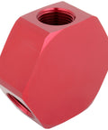 Red three-port Three In One Three Eighths Inch FNPT Hose Manifold for air compressors and pneumatic systems, angled view.