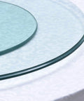 24 Inch Heavy Duty Lazy Susan 360-Degree Turntable With Tempered Glass on dining table, close-up view