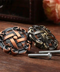 Old School Antique Brass Hollow Door Knob For Cabinets And Drawers with screws, detailed vintage design, on wood surface.
