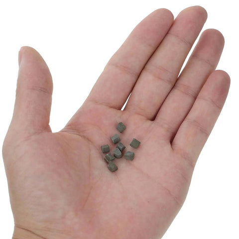 Hand holding Triangle Polishing Abrasive Media 4mm 500g for Tumbling Machines Jewelry Buffing and Rock Tumbling Polishers