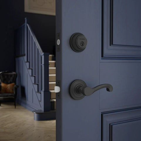 Heavy Duty Solid Brass Smart Deadbolt With Reliable Wifi And Bluetooth Hookup For Top Shelf Door Security In Sleek Polished Chrome Finish on a blue door.