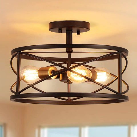 Three Light Semi Flush Mount Ceiling Light With Industrial Modern Farmhouse Style And Metal Cage 14 Inch Wide Oil Rubbed Bronze Finish E26 Base Rustic Yet Sleek Kitchen Hallway Living Room Bedroom Fixture with bulbs glowing inside metal cage.