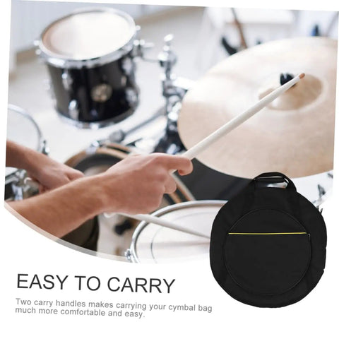 Hands holding a drumstick near a Rock Solid Marching Cymbal Bag With Sickly Padded Cushioning Spacious Zippered Pockets For Drums Sticks And Sheet Music Heavy Duty Oxford Fabric Built For Travel.