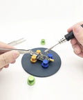 Adjustable Magnetic Soldering Fixture For PCB Boards with soldering tool and clamps on a metal base, DIY electronics workspace tool