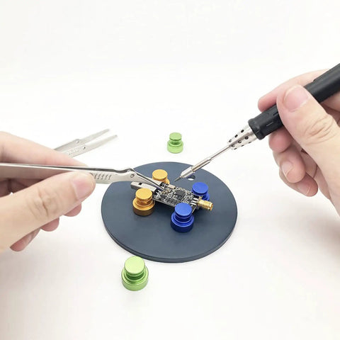 Adjustable Magnetic Soldering Fixture For PCB Boards with soldering tool and clamps on a metal base, DIY electronics workspace tool