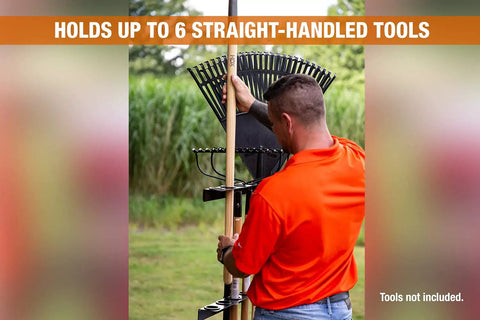 Person using Vertical Hand Tool Rack For Open Trailers Holds Up To Six Straight Handle Tools Like Shovels Rakes And Hoes With Secure Upright Storage