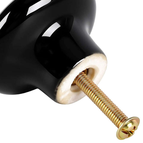 Close-up of single 30 Pack Dope Black Ceramic Cabinet Knobs 1.5 Inch (38mm) with screw inserted for installation