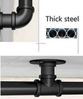 Heavy Duty Rustic Industrial Pipe Railing And Beefy Wrought Iron Handrail for Porches Decks Stairs showing thick steel pipe joints.