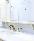 Dual-Handle Widespread Bathroom Sink Faucet in Brushed Gold Finish with 3-Hole Design, includes pop-up drain on vanity