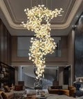 Showstopping Prismatic Glass Pendant Light, Long Retro Hanging Ceiling Fixture Brings French Design Vibes and Vintage Flair to Your Bedroom or Living Room Space to Amp Up Your Decor Game with Ease, cascading floral design in a modern living room.