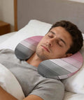 U Shaped Memory Foam Travel Neck Pillow With Pink Wood Grain Finish used by man resting in bed for head support and comfort