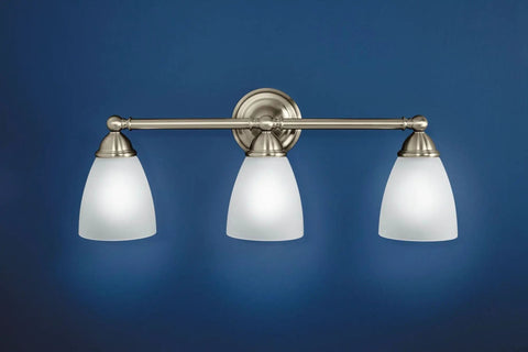 Brantford 3-Light Vanity Fixture In Chrome With Frosted Glass, Dual Mount Bath Light on blue background