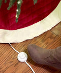 Nine Foot Three Outlet Extension Cord With Foot Switch on wooden floor next to boot, perfect for senior living, 125VAC, white