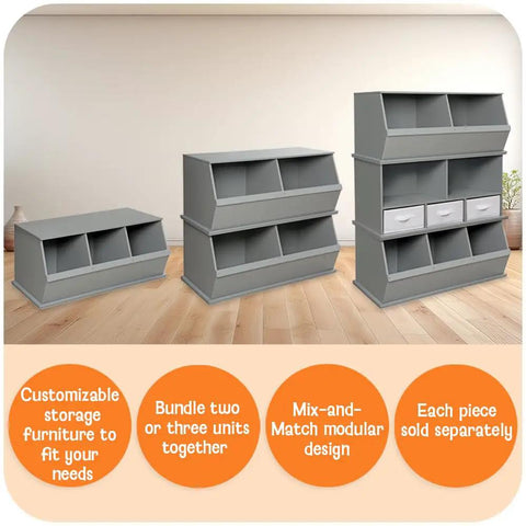 Three gray stackable toy storage units with solid panel construction and removable fabric bins for toys and crafts in a playroom.