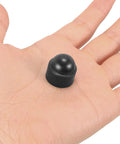 Hand holding M8 Plastic Hexagonal Dome Nut Caps Black Screw Protectors For Exposed Ends And Wire Insulation Sturdy Covers