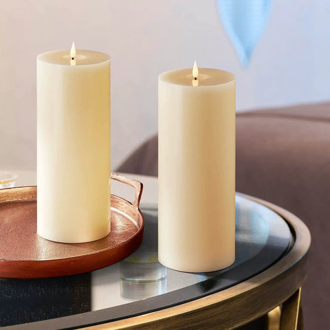 Flameless Pillar Candles With Remote Real Marble Wax 3 Pack 3 Inch Diameter Pillars 3D Flickering LED Flame Batteries Included Cozy Thanksgiving Table Decor on a modern table setting.
