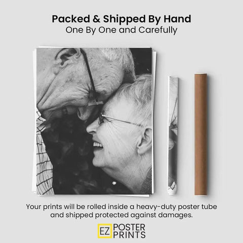 Two elderly people smiling at each other, printed on a black and white poster packed in a tube for safe shipping.