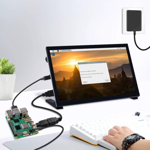Dope 27W USB C PD Power Supply For Raspberry Pi 5 Charger with cables connected to monitor and keyboard in home setup