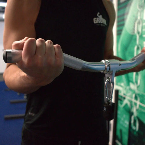 Man using Aluminum Revolving Curl Bar With Cable Attachments For Functional Trainers And Gym Cable Machines, Built To Last For Bicep Curls