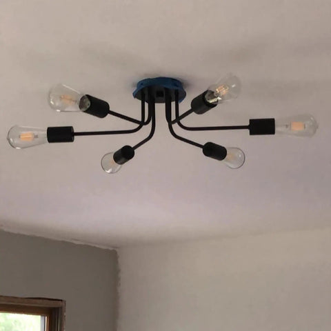 Six Light Semi Flush Mount Sputnik Ceiling Light Fixture Slick Black Metal Chandelier With E26 Base installed in room