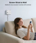 Woman using phone next to 3 Outlet Power Strip With 3 USB Ports And 10 Foot Cord, Flat Plug, Wall Mountable on wall, White