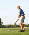 Man using Rescue Hybrid Golf Club For Men 2 Through P Right Handed on course, demonstrating forgiving long iron replacement with graphite shaft.