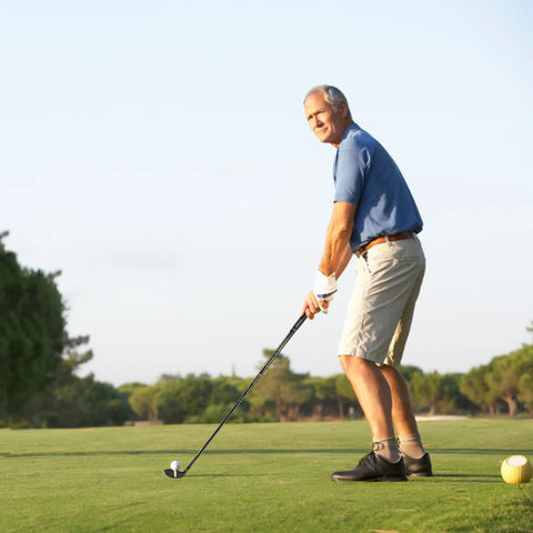Man using Rescue Hybrid Golf Club For Men 2 Through P Right Handed on course, demonstrating forgiving long iron replacement with graphite shaft.