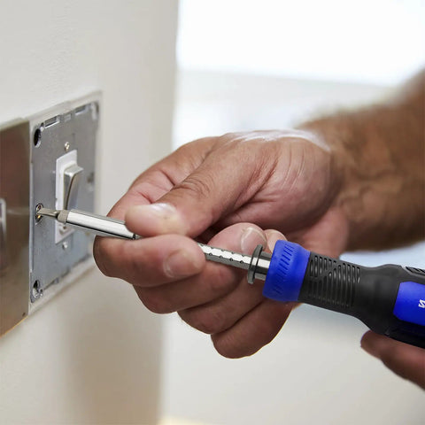 Using Heavy Duty 13 In 1 Adjustable Screwdriver Set With Premium Torx Phillips Hex Bits to install a switch.