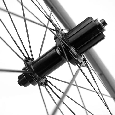 Close-up of hub and spokes on the Carbon Road Wheelset 700c Matte Finish Clincher With 88mm Rim Brake For Fast Lightweight Rides